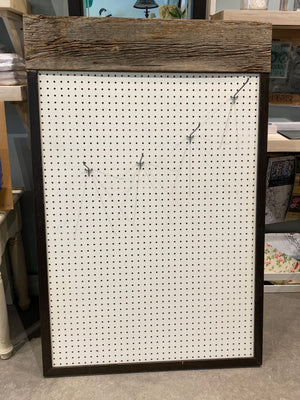 Custom Made Pegboard Display with Wood Top