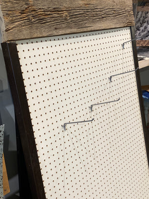 Custom Made Pegboard Display with Wood Top