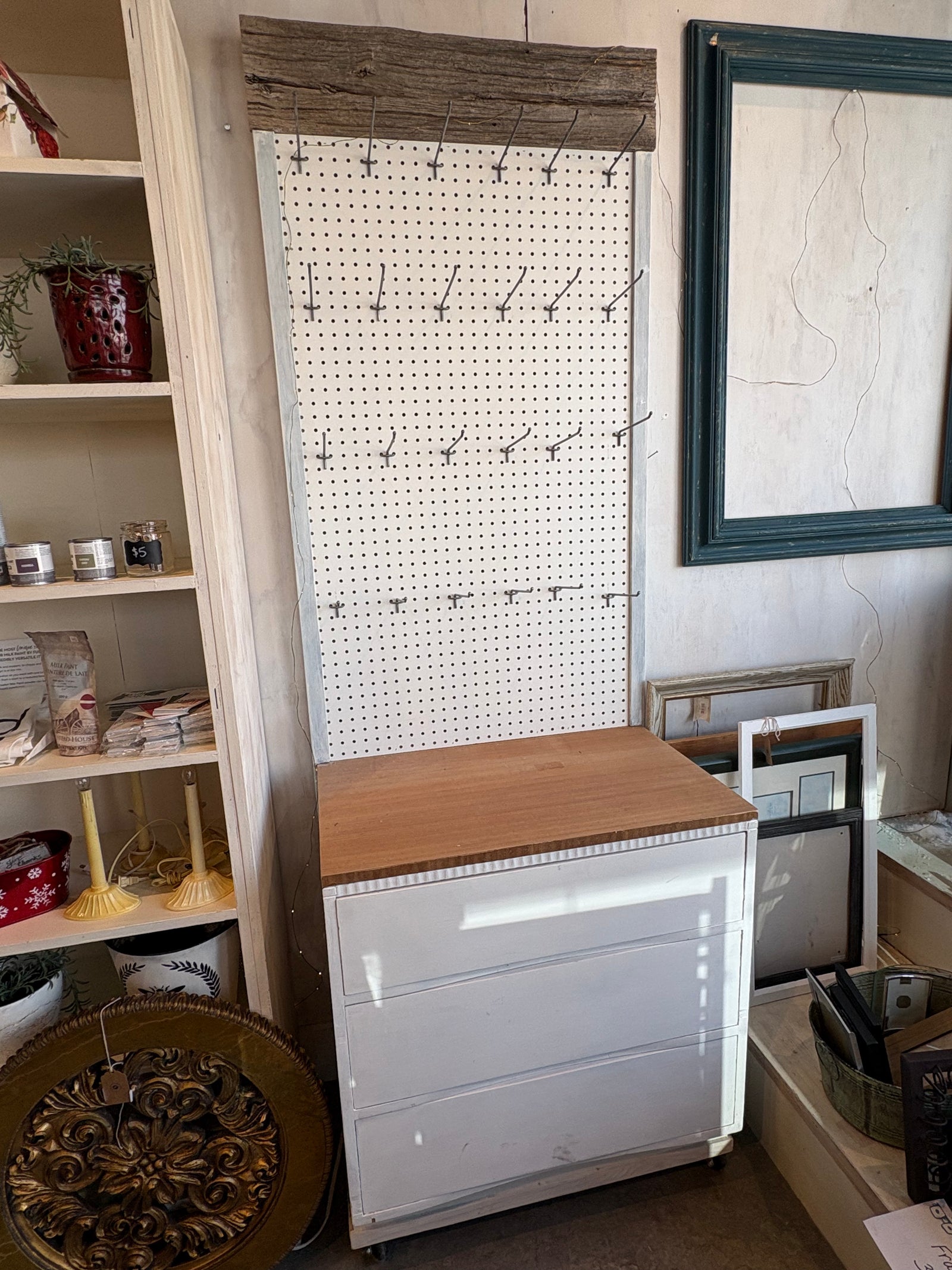 Pegboard with Attached Drawers on Wheels