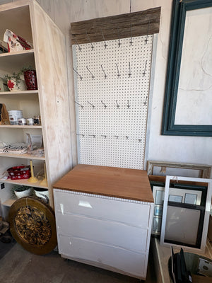 Pegboard with Attached Drawers on Wheels